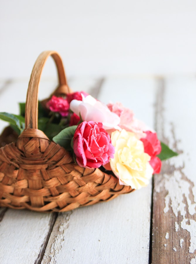 Old handmade basket with flowers