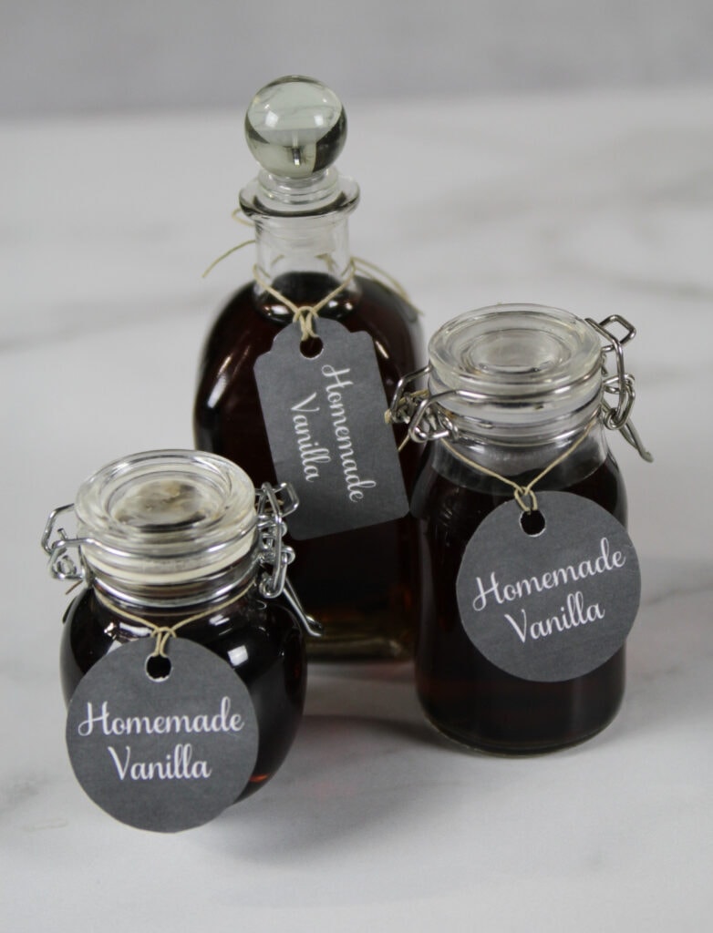 Small bottles of homemade vanilla with printable tags