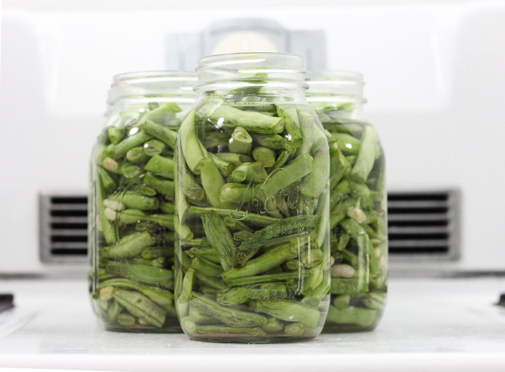 Showing green beans in jars