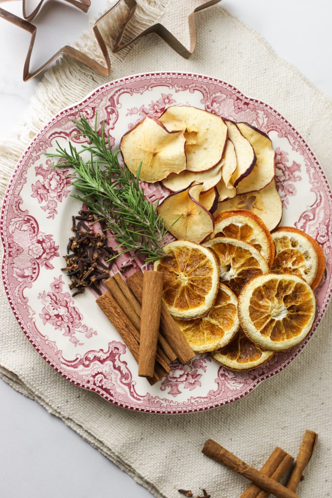 red and white plate with dried fruit for potpourri